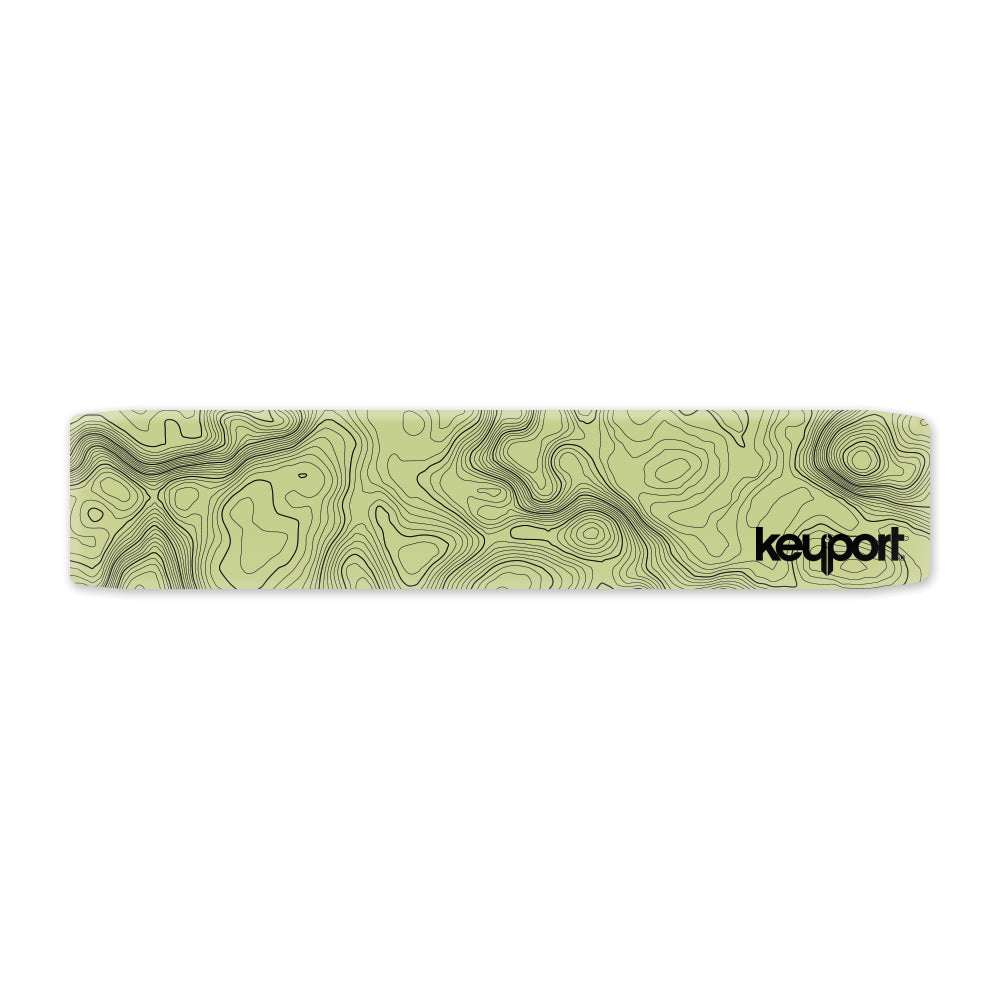 Keyport faceplate with glow in the dark topographic design on a white background