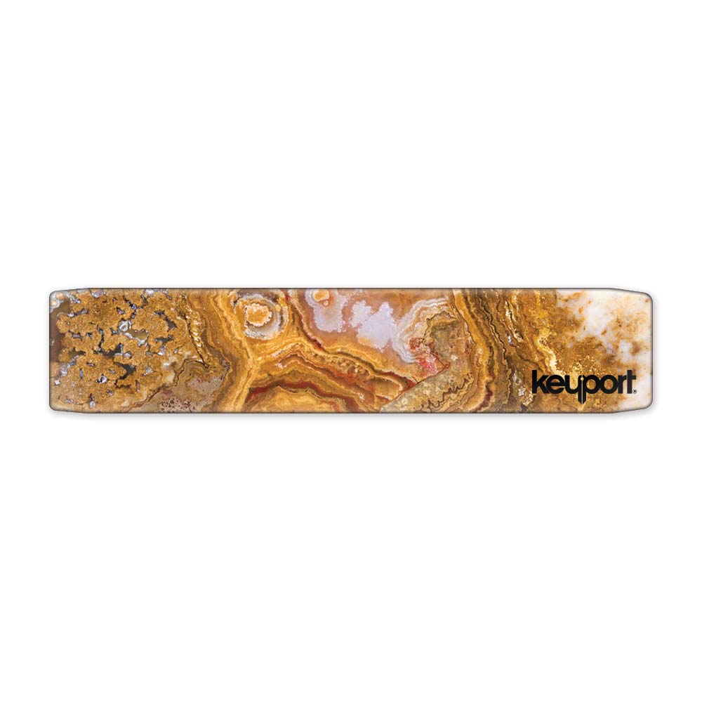 Keyport Faceplate with a red and orange marble design featuring swirling patterns