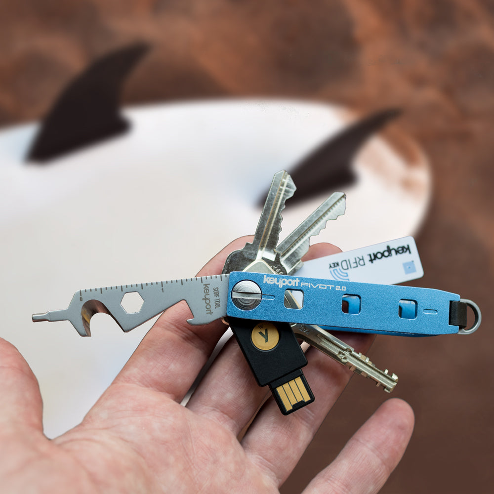 Blue Keyport Pivot 2.0 key organizer with 5-in-1 Surf Tool, 3 keys, Keyport RFID Key, and YubiKey